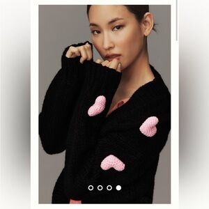 Chic Black Sweater with Pink Heart Accents